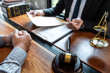lawyer and client at desk
